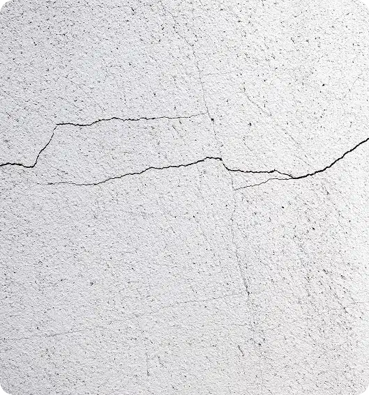Diagnostic et réparation de fissures sur un pignon de maison en Nord Isère